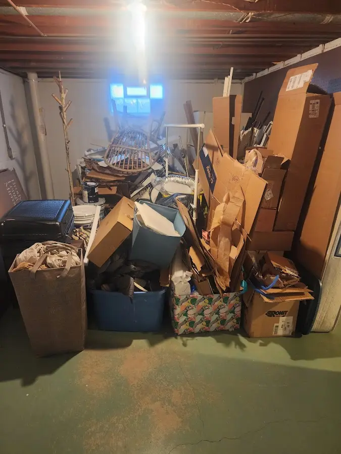 Roll-off dumpster container at job site for 4 Yard Dumpster Rental in Sheridan